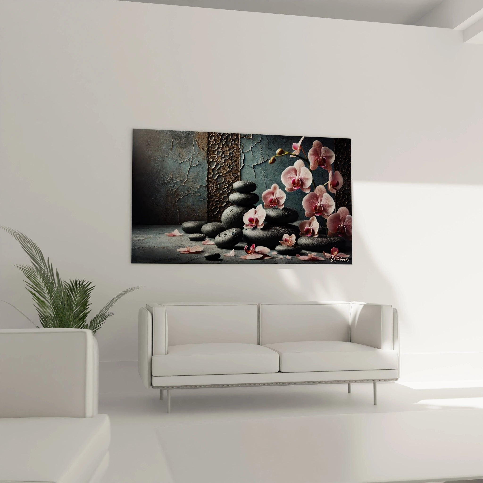 Nahaufnahme schwarzer Zen-Steine mit rosa Orchideenblüten und Blütenblättern