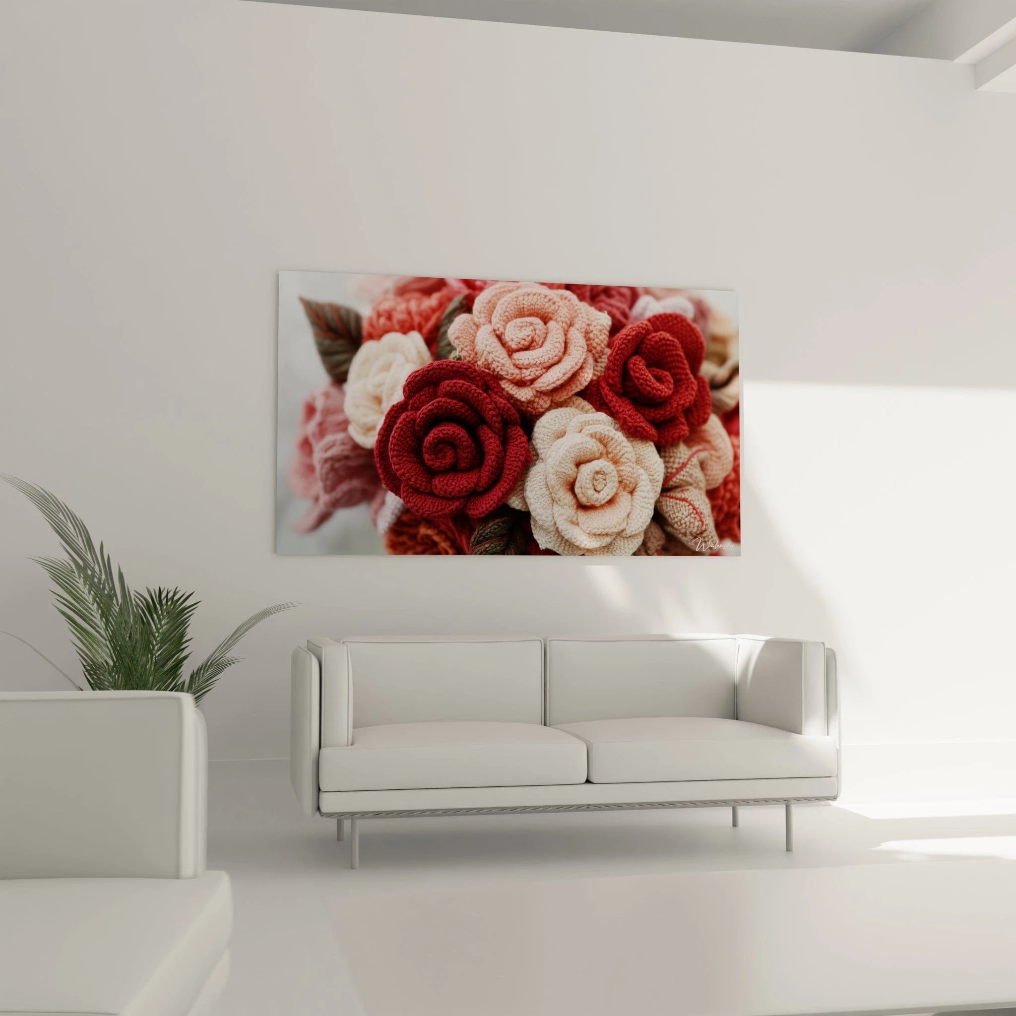 Nahaufnahme gehäkelter Rosen, detaillierte Häkelstruktur in rosa und roten Farbtönen