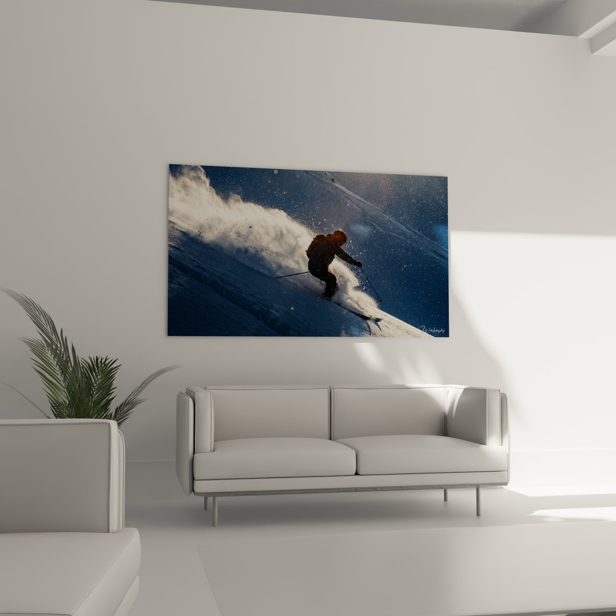 Detailaufnahme der wirbelnden Schneekristalle und dynamischen Bewegung des Skifahrers