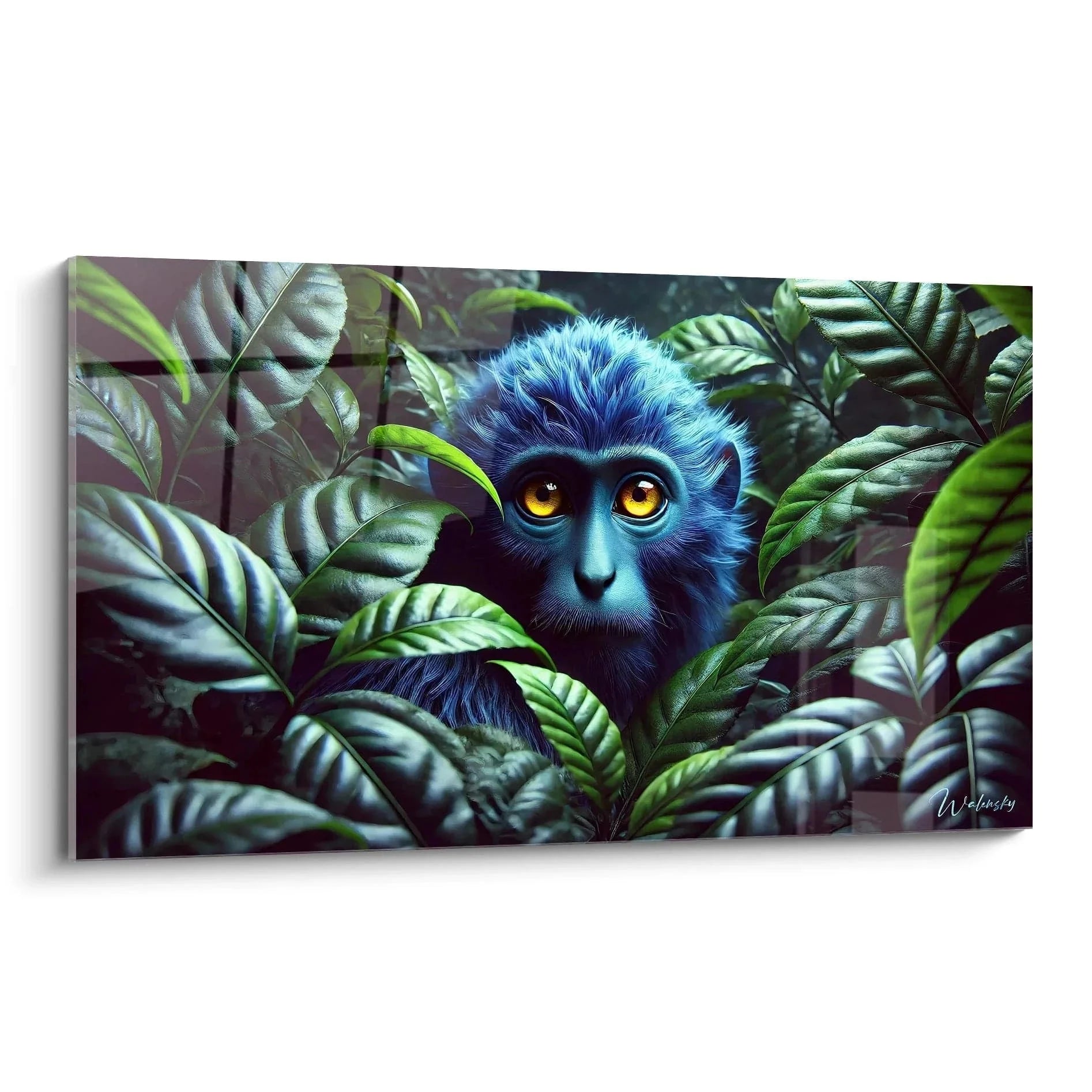 Wandbild Blauer Affe mit bernsteinfarbenen Augen im tropischen Dschungel zwischen grünen Blättern
