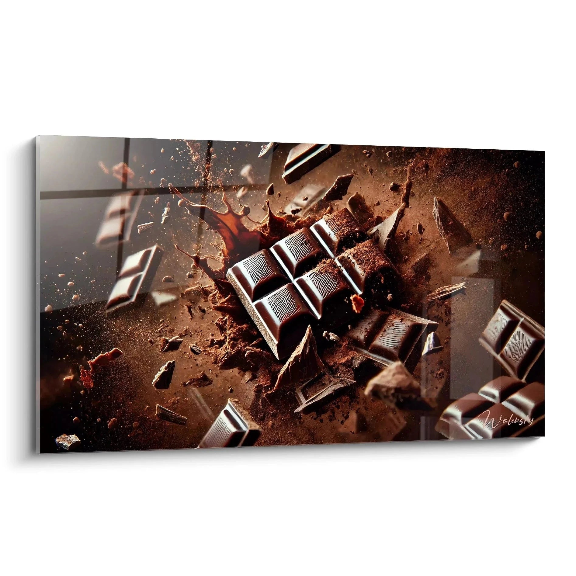 Wandbild Schokolade zeigt explodierende Schokoladentafel mit fliegenden Stücken und Kakaopulver