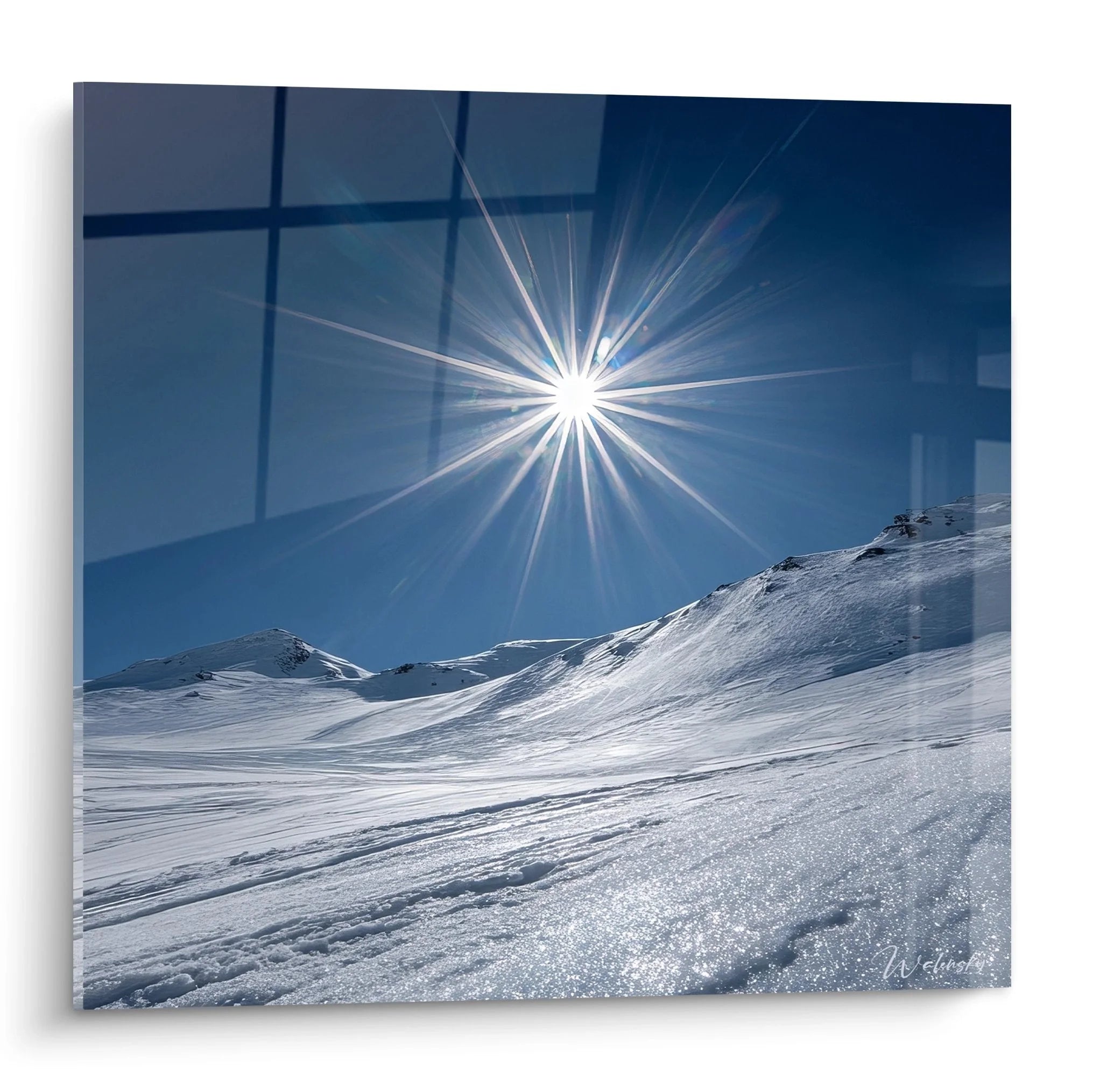 Wandbild Winterlandschaft mit strahlendem Sonnenstern über verschneiten Bergen - Premium Winterdekoration